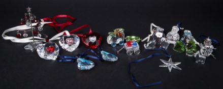 Swarovski Crystal Glass, a collection of fourteen pieces including Christmas ornament Chandelier set