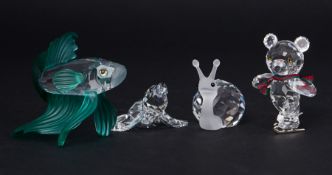 Swarovski Crystal Glass, a small collection of four pieces including 'Snail', 'Siamese Fighting