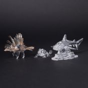 Swarovski Crystal Glass, 'Shark Baby', 'Lion Fish' and another, boxed.