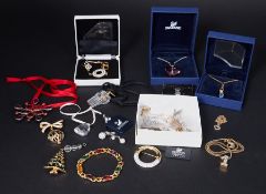 Swarovski Crystal Glass, a collection of Jewellery, brooches etc.