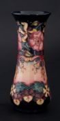 Moorcroft, a tapering vase, circa 1993, decorated with Poppys, height 20.50cm.