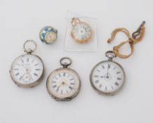 Three silver pocket watches with ornate engraving and decorated dials one marked H Samuel, a vintage