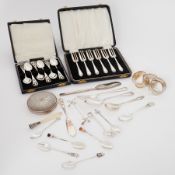 A mixed lot of silver items to include napkin rings, compact, spoons, fork etc, total weight 9.05oz,