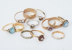 Twelve hallmarked gold rings to include wedding bands and gem-set, mostly 9ct, total weight 36.