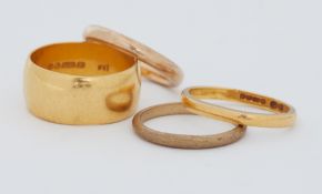 Four wedding bands to include two 22ct yellow gold wedding bands, total weight 13.08gm and two 9ct