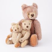 Three vintage teddy bears probably by Steiff one with pink mohair.