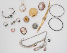 A mixed lot of costume & silver jewellery to include bangles, rings, cameos, pendants, brooch,