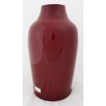 An 18th/19th century Chinese boeuf jar with rich red glaze, converted to a lamp base, restored,