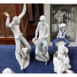 Three Lladro figurines including Boy and Girl on See-Saw (some damages).