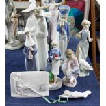 Six Lladro figurines, Lladro collectors society stand and another figure not marked (6).