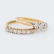 An 18ct yellow gold half eternity style ring set with 0.20 carats total weight of round brilliant