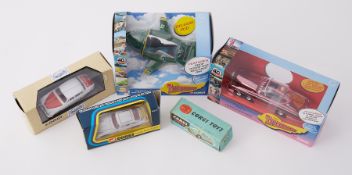 Five various diecast models including replica Corgi Thunderbirds and James Bond plus blank for empty