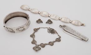 Some vintage & antique silver items to include a silver flower engraved bangle, marcasite necklace &