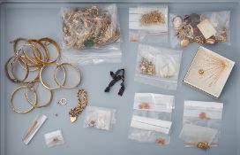 A mixed lot of costume, silver & gold plated jewellery to include bangles, necklaces, pendants,