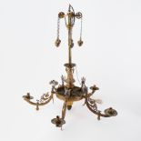 A large early 20th century ornate brass five branch hanging chandelier decorated with birds in