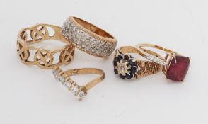 Five 9ct yellow gold rings including a Celtic design band, cz set rings, etc, total weight 19.20gm.