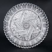 A cut crystal glass dish, circa 1930's decorated with the Star of David decoration, diameter 29cm.