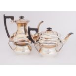 A silver tea service to include a silver teapot, 22oz, a silver milk pourer, 6.43oz, a silver two