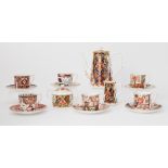 Royal Crown Derby coffee set comprising six cups and saucers, milk jug and sugar pot, each named