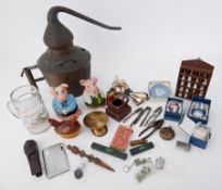 Various items including large copper spirit filter, NatWest Pigs, novelty carved wood nut cracker,