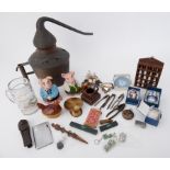 Various items including large copper spirit filter, NatWest Pigs, novelty carved wood nut cracker,