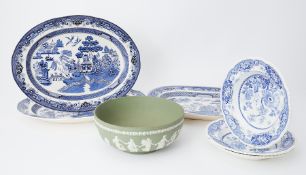 Three large blue and white platers, a large green Wedgwood bowl etc.
