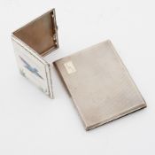 Two silver cigarette cases approx 9oz, one with enamelled decoration of a kingfisher (damaged) 9cm x