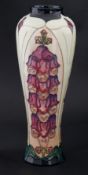 Moorcroft, a large vase, marked 93, with purple fox gloves, height 36cm.