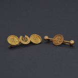 Two Oriental brooches to include an 18ct yellow gold brooch made up of two outer discs with