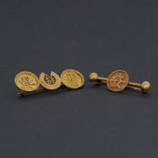 Two Oriental brooches to include an 18ct yellow gold brooch made up of two outer discs with