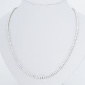 An impressive 18ct white gold 28" diamond line necklace set with approx. 26.80 carats of round