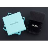 A Tiffany & Co 18ct white gold & diamond 'Vine' ring set with 0.42 carats total weight of round