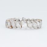 An impressive white gold full eternity style ring set with approx. 2.00 carats total weight of