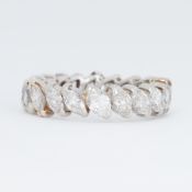 An impressive white gold full eternity style ring set with approx. 2.00 carats total weight of