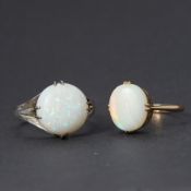 Two opal rings to include an 18ct yellow gold ring set with an oval cabochon cut opal, approx. 2.