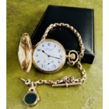 An early 20th century 9ct gold full hunter pocket watch with keyless movement, Everite,