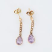 A pair of yellow gold drop earring set with seed pearls and a pear shaped amethyst, length approx.