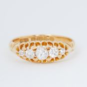 An antique 18ct yellow gold five stone ring set with five graduated old cut diamonds, total