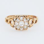 An antique yellow gold flower cluster ring set with old cut diamonds, total diamond weight approx.