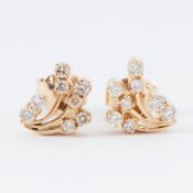 A pair of 18ct yellow gold earrings set with small round brilliant cut diamonds, length approx. 1cm,