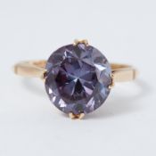 A yellow gold ring set with a round cut Alexandrite, approx. 4.40 carats 2.83gm, size M 1/2, (