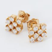 A pair of 18ct yellow gold earrings set with round brilliant cut diamonds, total diamond weight