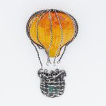 A silver & amber hot air balloon brooch (please note the silver basket has detached from the