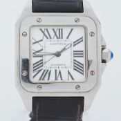 Cartier, a stainless steel automatic Cartier Santos 100, on black leather crocodile effect strap