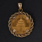 A 1986 Chinese temple & panda gold 10 Yuan coin in a 14k yellow gold pendant mount, 5.73gm.
