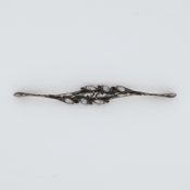 A Georgian 'leaf' design bar brooch set with old rough cut diamonds and an old pear shaped