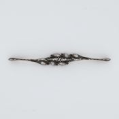 A Georgian 'leaf' design bar brooch set with old rough cut diamonds and an old pear shaped