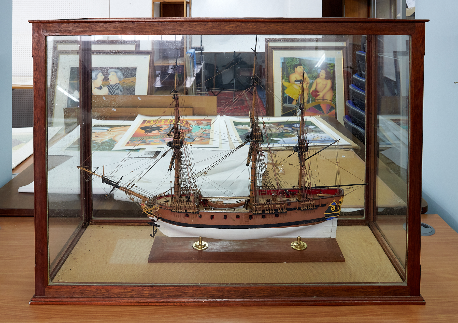 A large scale model boat 'Myrmidon' fitted within a case, overall size including case 67cm x 93cm.