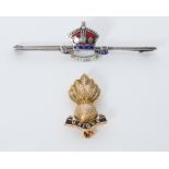 A 9ct yellow gold & black enamel Ubique Military badge, 4.7gm and a silver metal & enamel George V