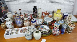 A collection of Japanese ceramics, various vases, plates etc.